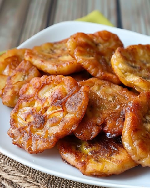A plate of banana fritters.